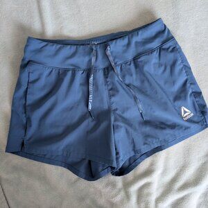 3/$30 Reebok blue athletic shorts